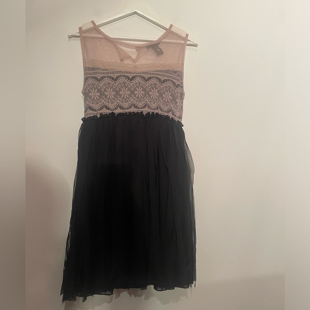 Sheer black nude pattern dress with fringe‎ bottom medium